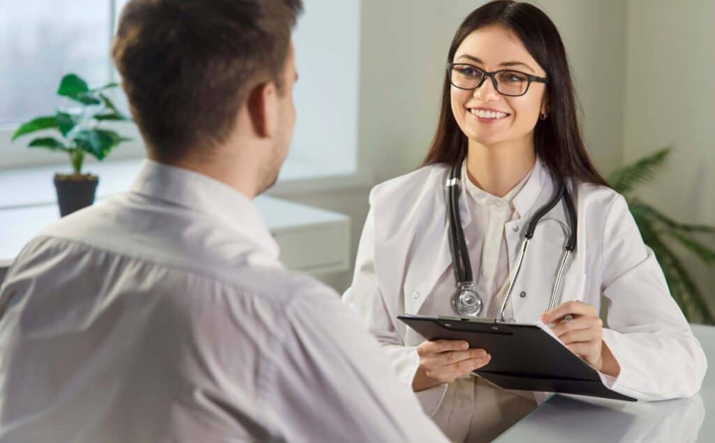 Clinician guiding a client through Worcester rehab in Massachusetts.