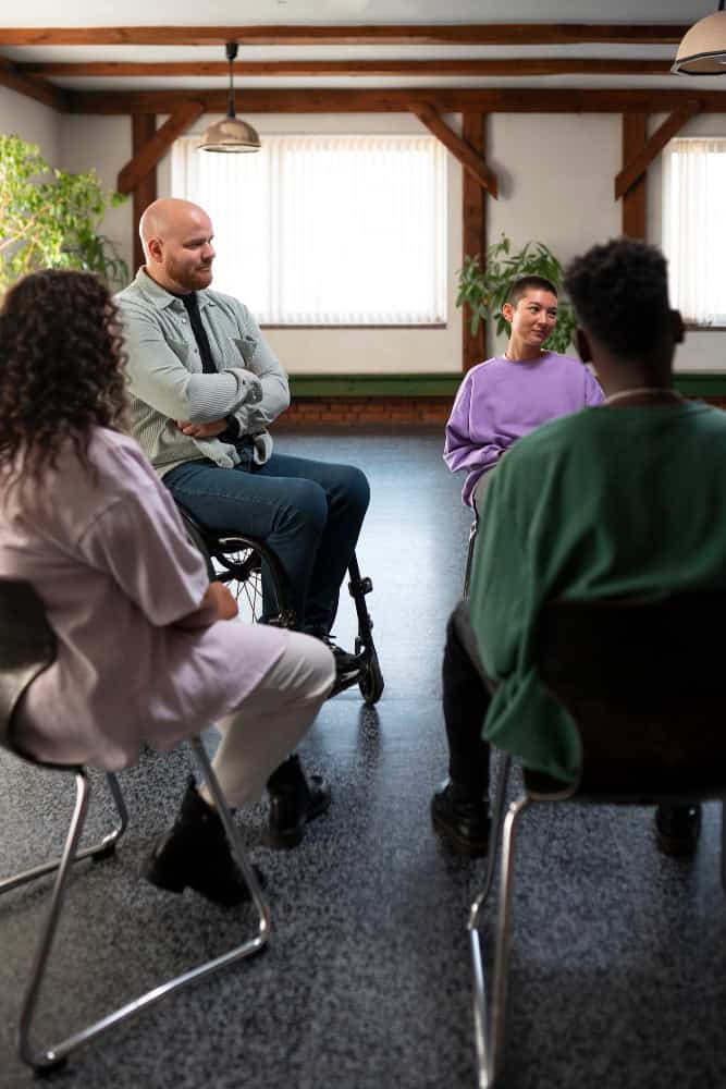 People attending group therapy during Xanax addiction treatment Hanover recovery session