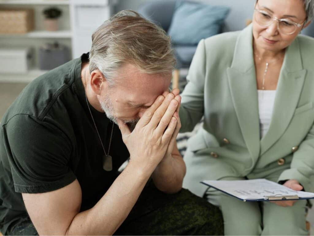 Man receiving professional support during drug rehab in Hanover, MA.