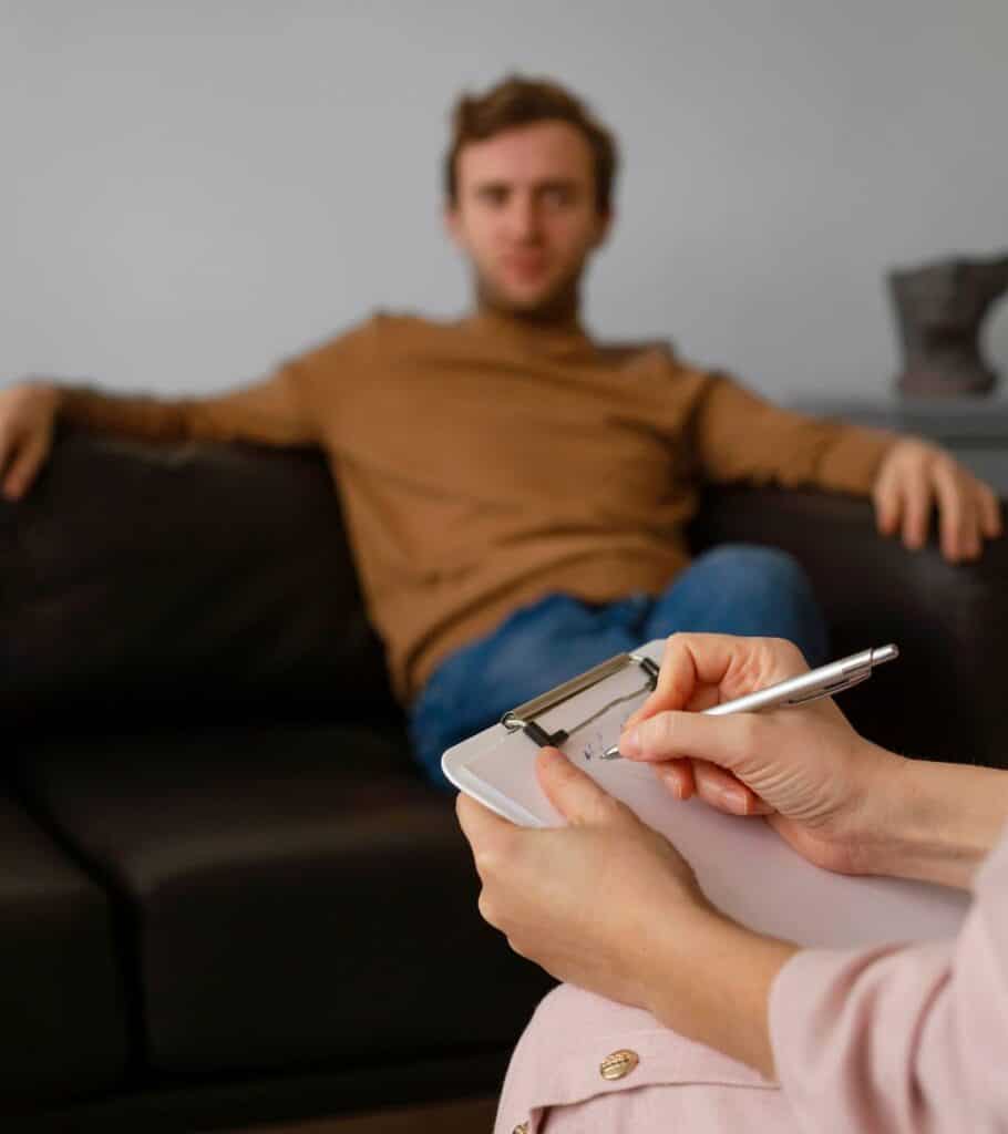 Client meeting privately with a therapist during opioid addiction treatment in Hanover.