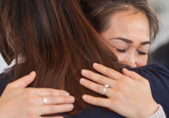 Woman reunited with loved one during treatment at our rehab in Hanover.