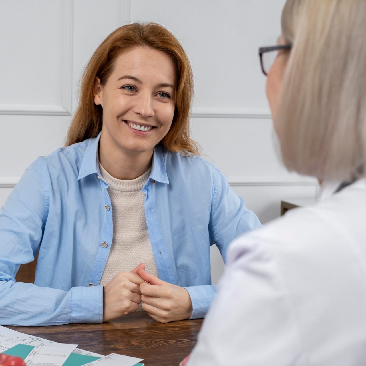 A woman enjoys a consultation for Heroin Addiction Treatment in Hanover, MA.