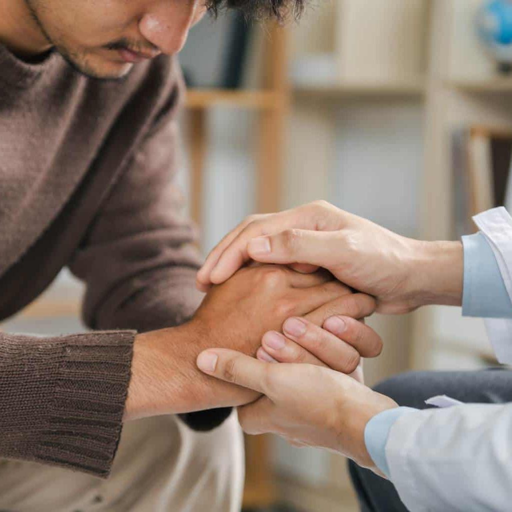Counselor offering support to a client in meth addiction treatment in Hanover.