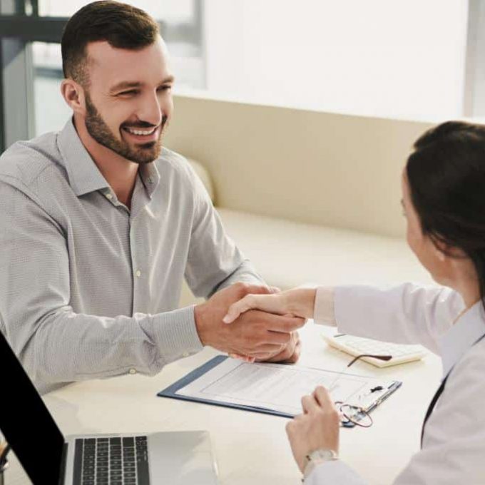Man meeting with a clinician to begin drug rehab in Hanover, MA.